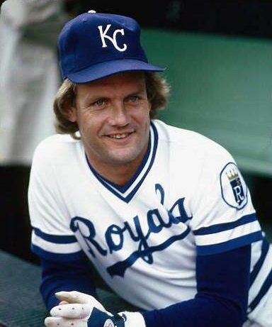 Former Kansas City Royals George Brett (C) stands near the batting